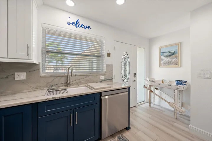 The front window provides excellent natural light and a beautiful view of the front patio.