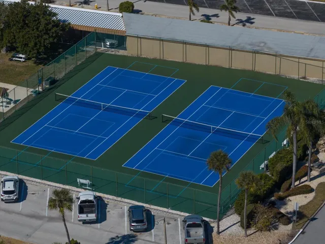 The tennis and pickleball courts are in excellent condition and offer a highly active space for recreation.