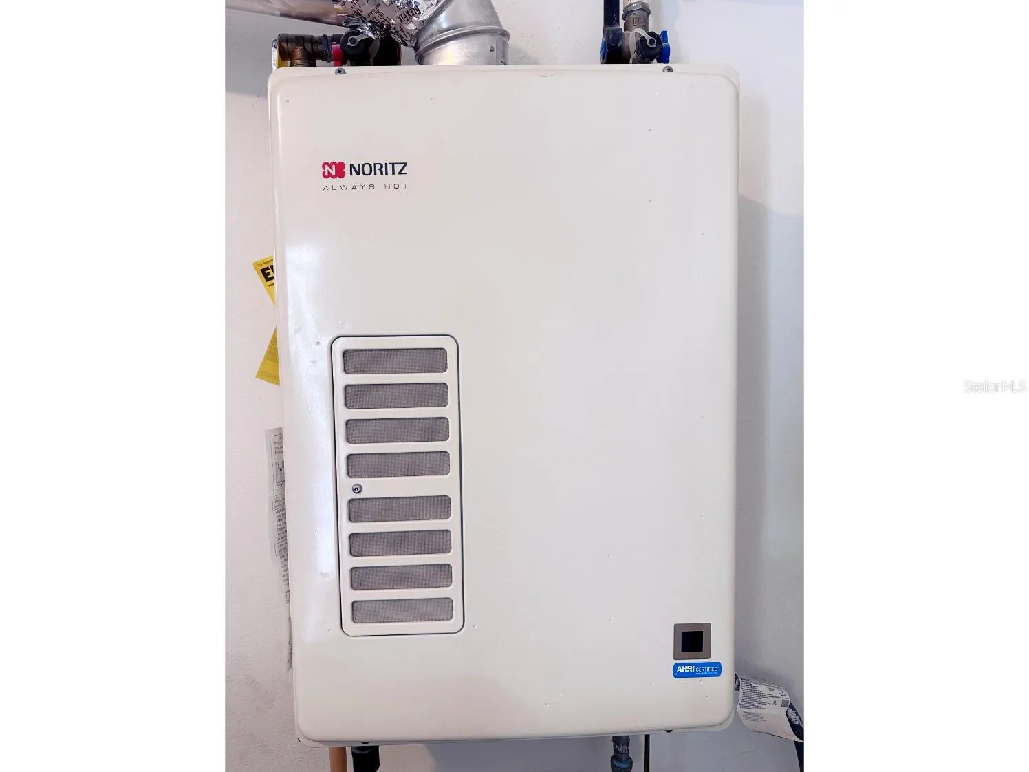 Tankless Hot Water Heater in laundry Room