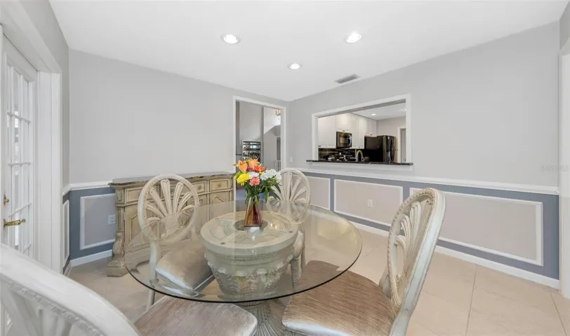 Dining room with decorative wainscot