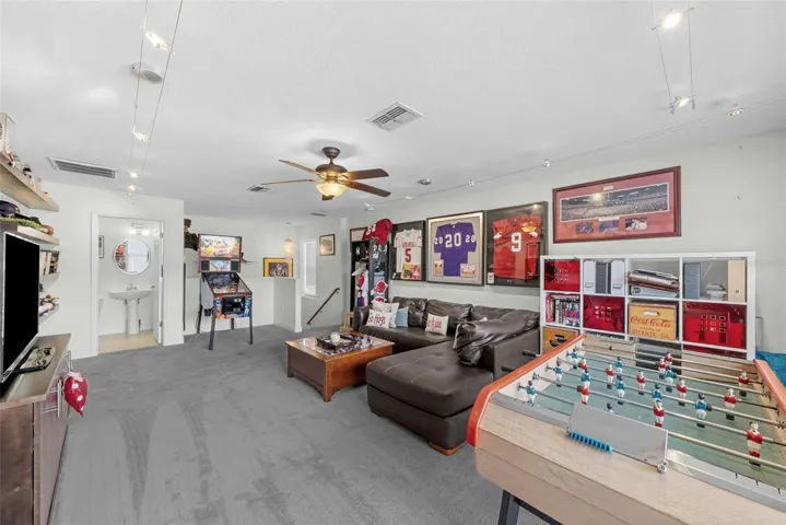Upstairs bonus room with space for entertaining and hobbies.