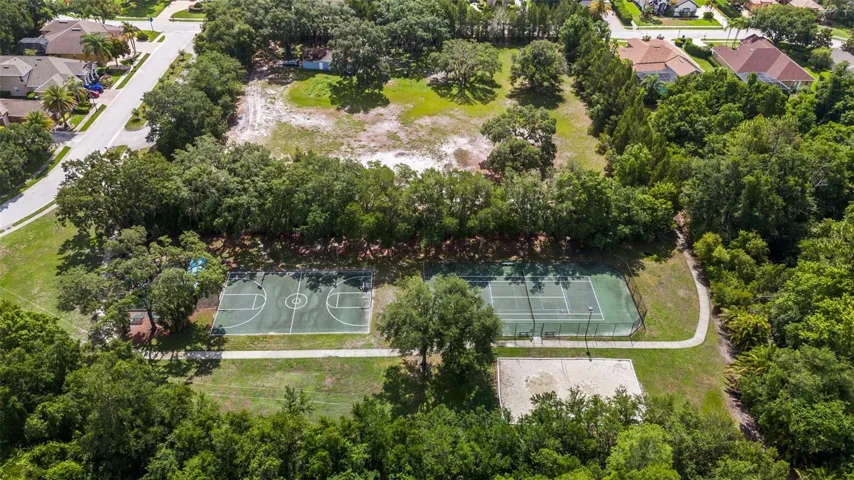 Community tennis courts and recreation area.