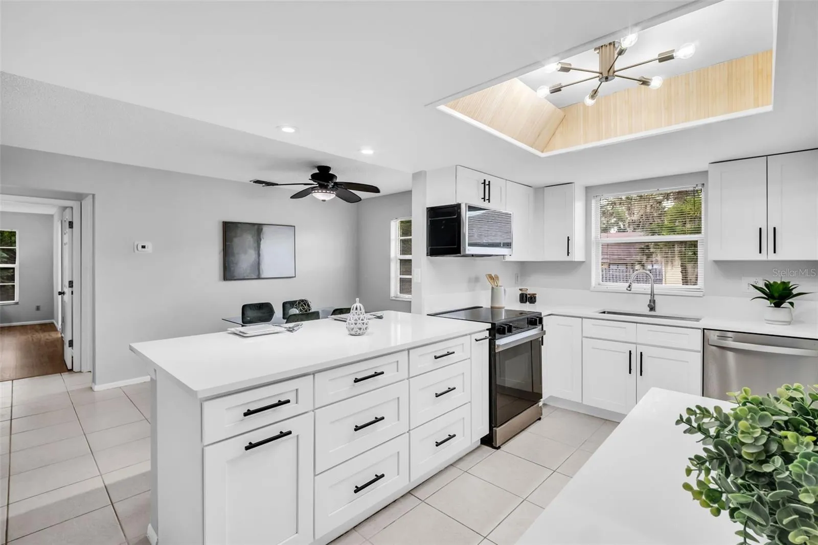 Stunning quartz countertops, new soft-close cabinets, and all new stainless appliances~