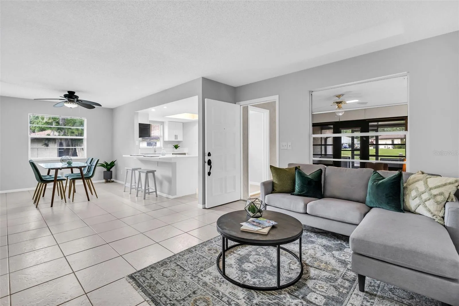 Gracious front entry into the open floor plan for easy living~