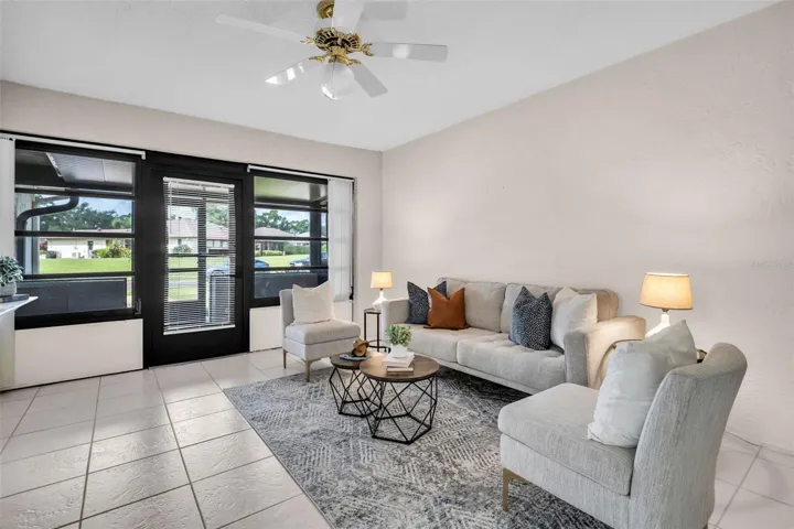 Large front windows allow natural light to flood the space~