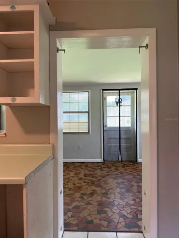 Kitchen going to Sunroom