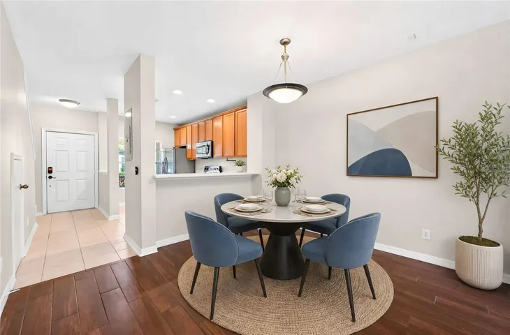 Enjoy a light, bright seamless flow through the main floor. Virtually Staged.