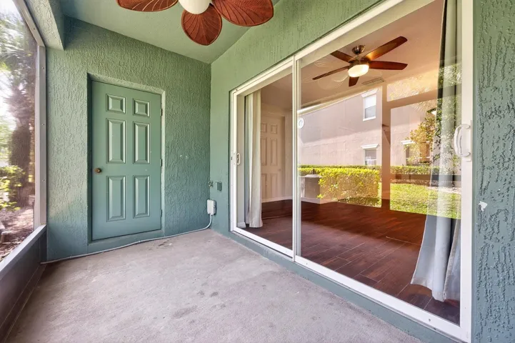 Screened lanai features exterior storage.