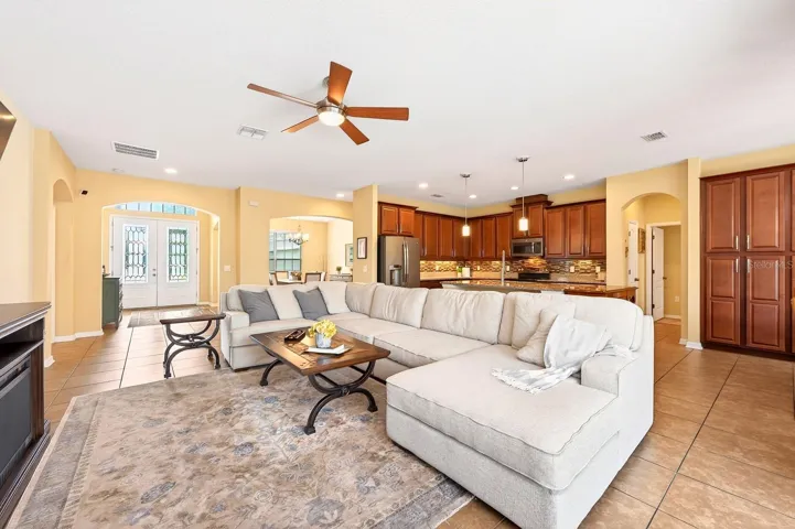 Designed with both comfort and entertaining in mind, the SPACIOUS OPEN FLOOR PLAN centers around a SHOWSTOPPER KITCHEN that overlooks the Living Room.