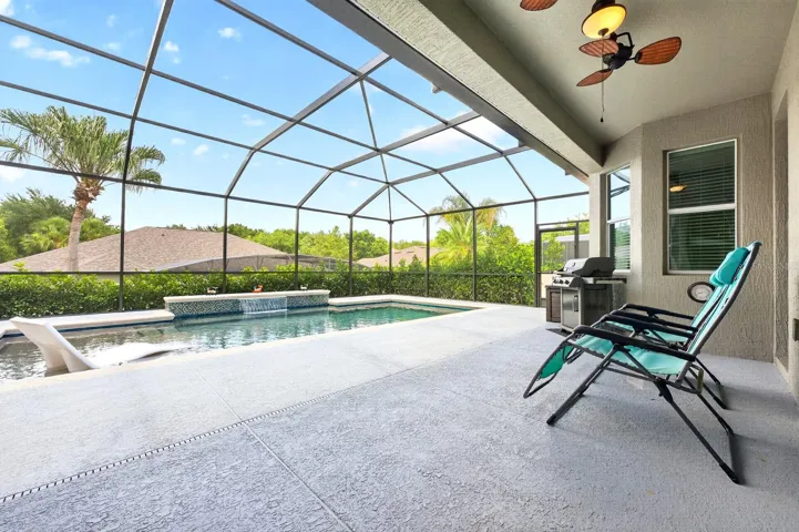 Sliding doors provide seamless access to the OUTDOOR OASIS.