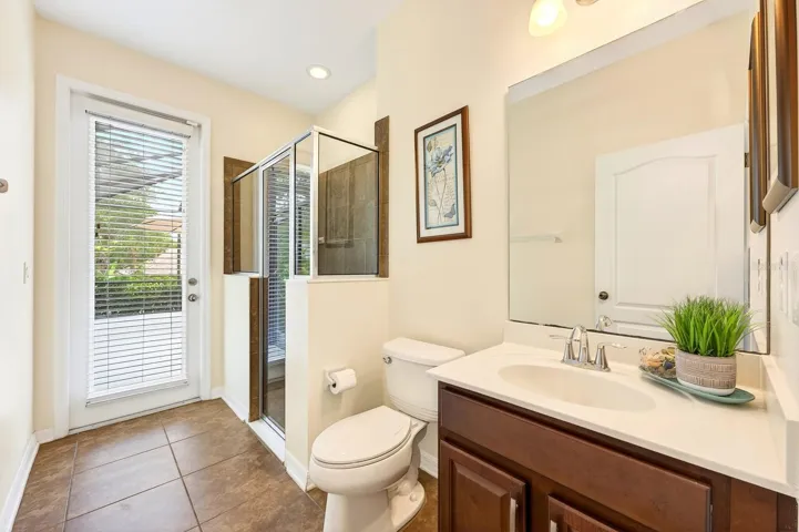 One of 3 Bathrooms is conveniently located near the secondary Bedrooms with access from the pool.