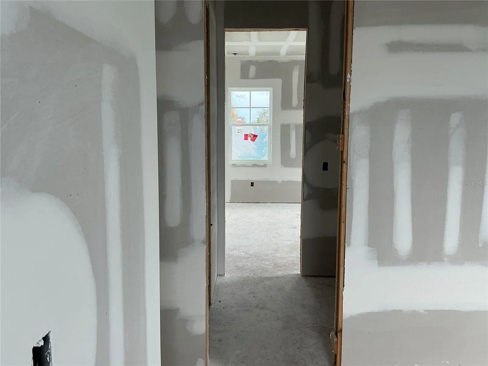 Bedroom view going into shared bath