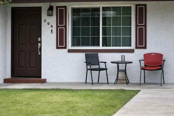 Charming front porch—perfect for morning coffee or relaxing in the evening.