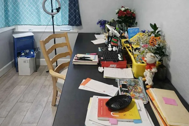 Dining or versatile flex space ideal for a home office, study area, or creative workspace.