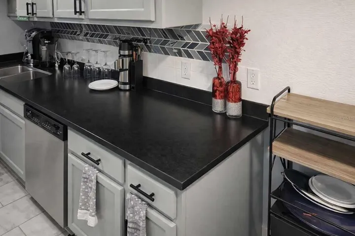 Stylish kitchen details with on-trend backsplash and contemporary design elements.