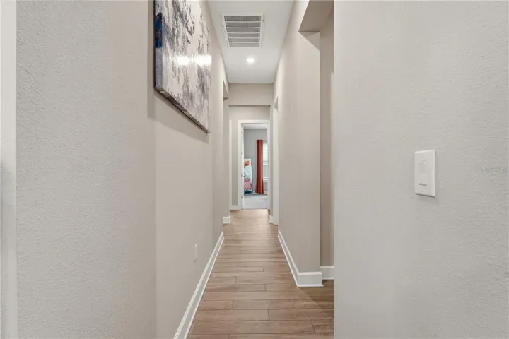 hall/foyer to secondary bedrooms and bathroom