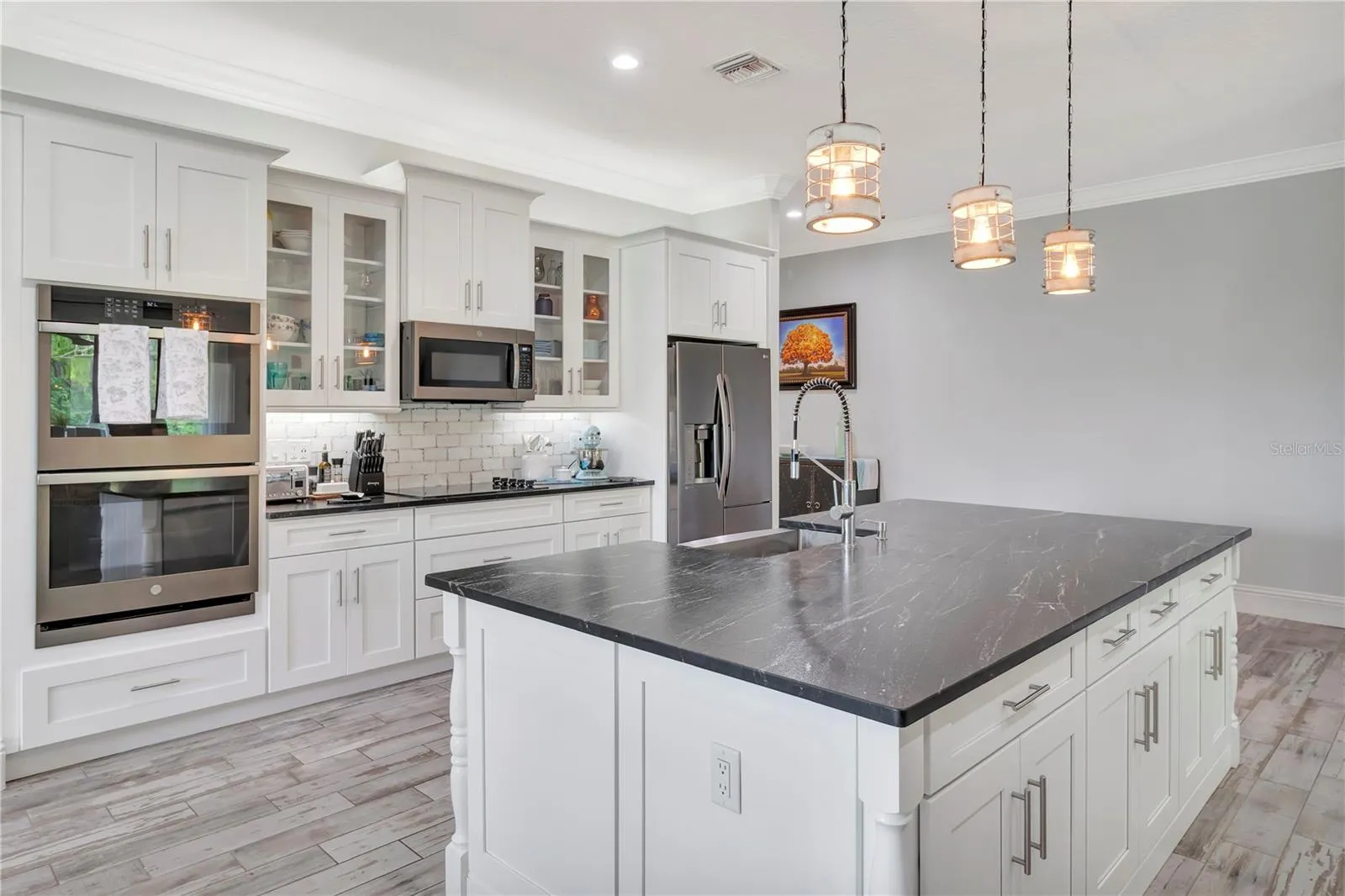 Kitchen with Double Ovens and Pendant Lighting