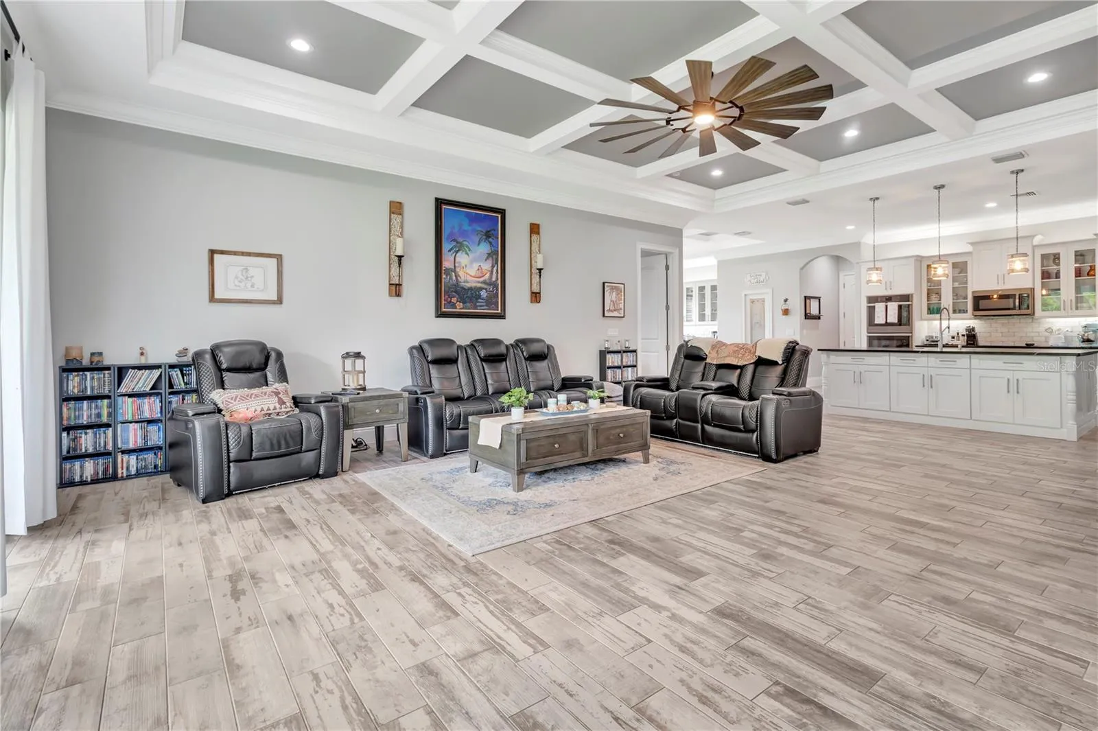 Living Room with Beautiful Coffered Ceilings and Can Lighting