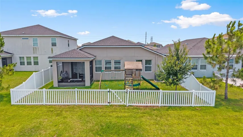 FULLY FENCED in YARD