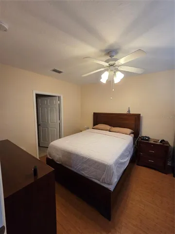 Primary bedroom laminate flooring