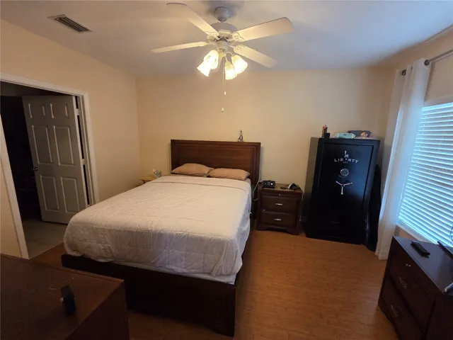 laminate flooring in primary bedroom