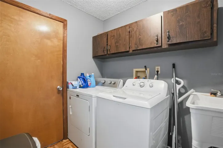 Laundry room with laundry sink.