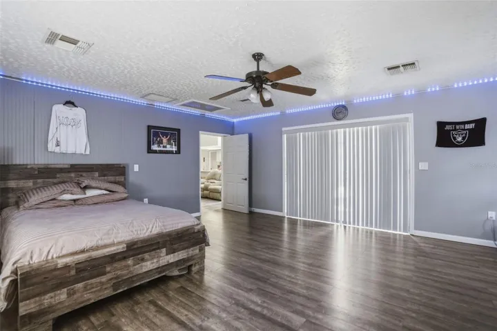 Large bonus room with glass sliders to the pool.