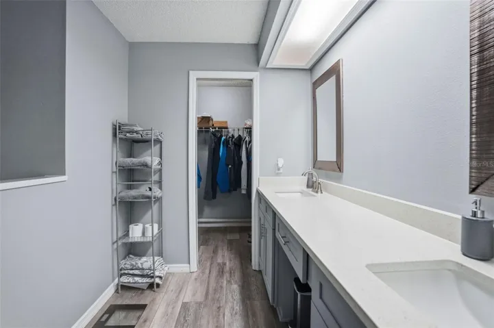 Remodeled master bathroom with Quartz countertops, new shaker cabinets.
