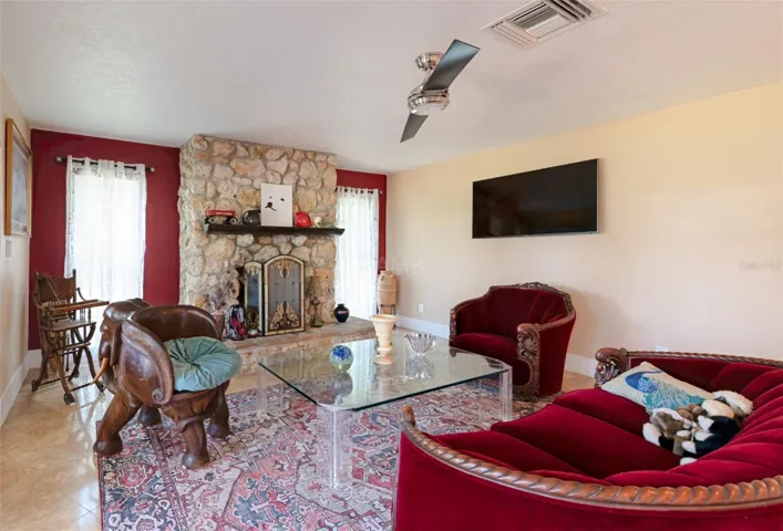 Family room with wood burning fireplace