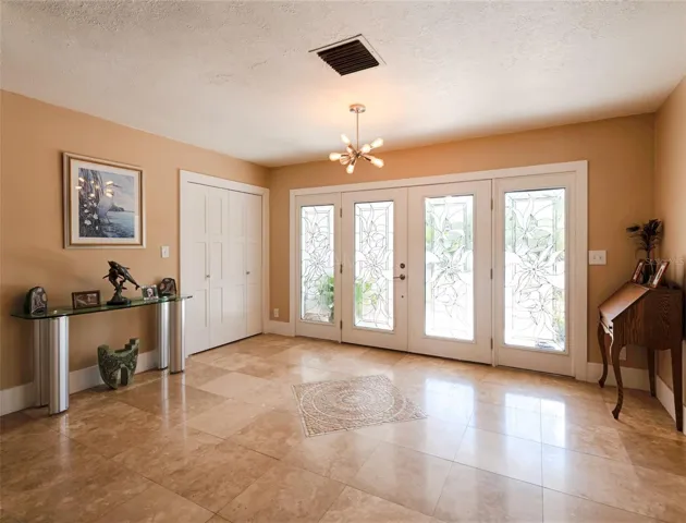 Travertine Marble floors throughout!
