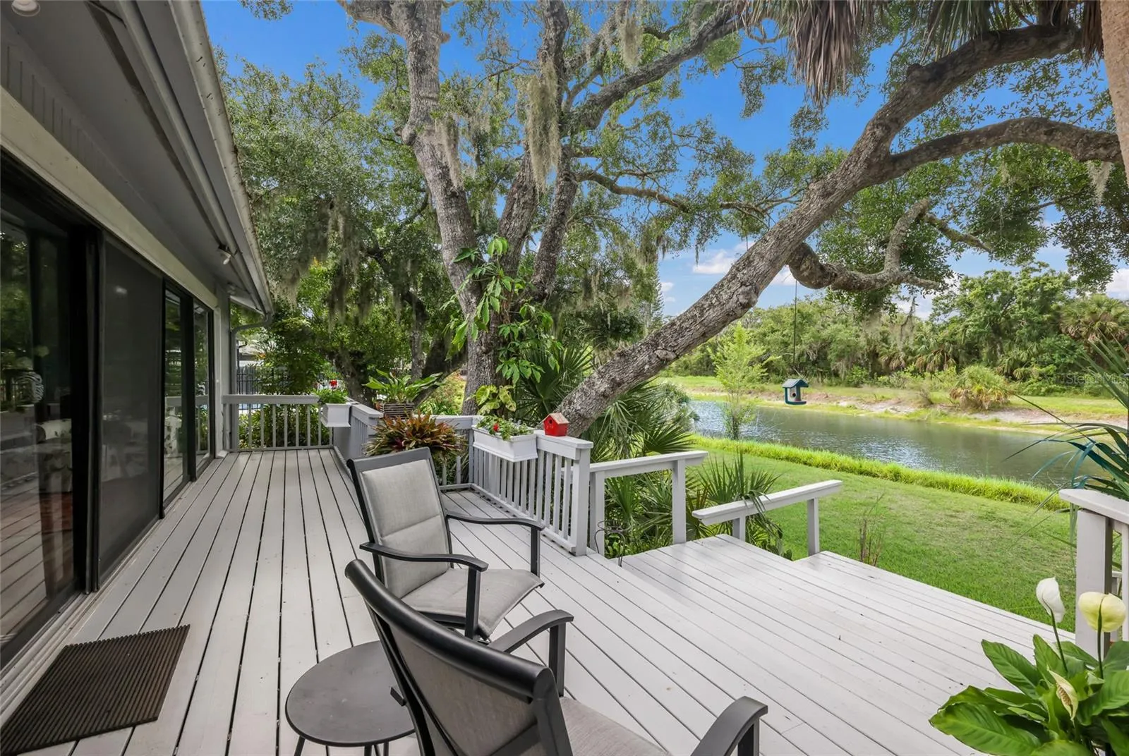Newer 30-ft. deck, the perfect place for morning coffee, outdoor dining, or simply relaxing.
