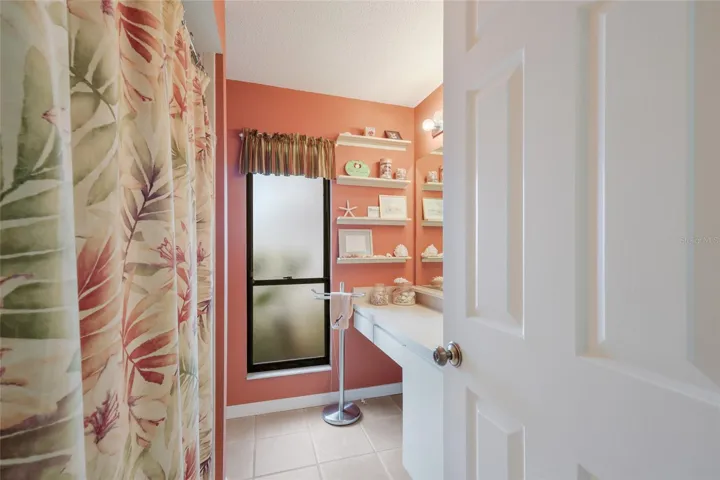 Guest bathroom with tub/shower.