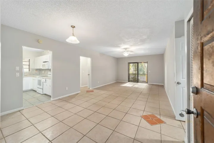 Large Living/ Dining Area with Ceramic Flooring