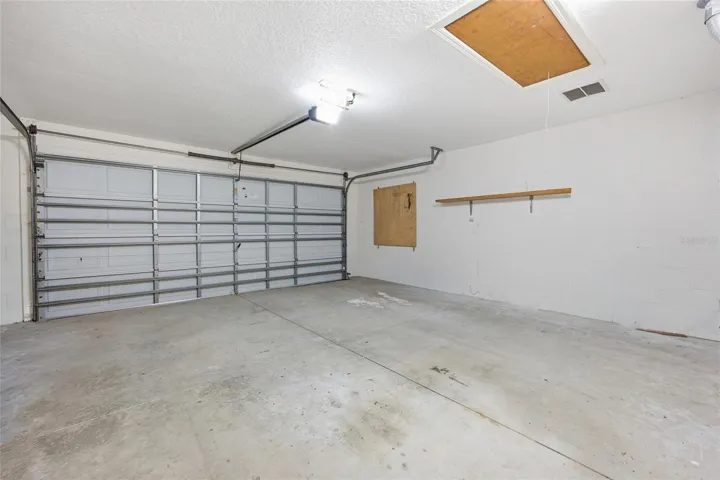 2 Car garage Attic access with pull down ladder