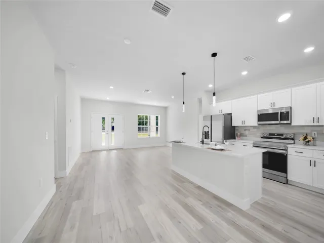 Open-concept living space overlooking the kitchen