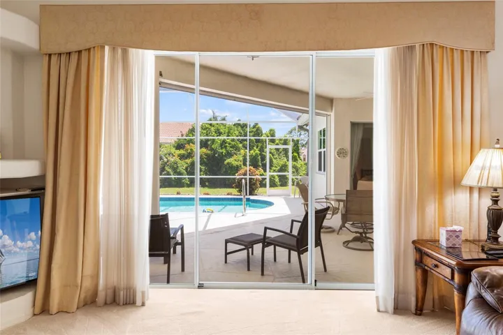 Sheer Neutral drapes in family Room