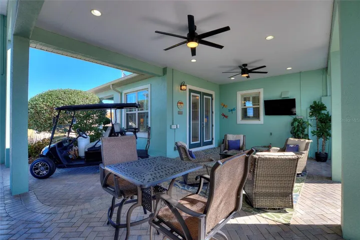 16x24 breezeway with ceiling fans facing front of the house