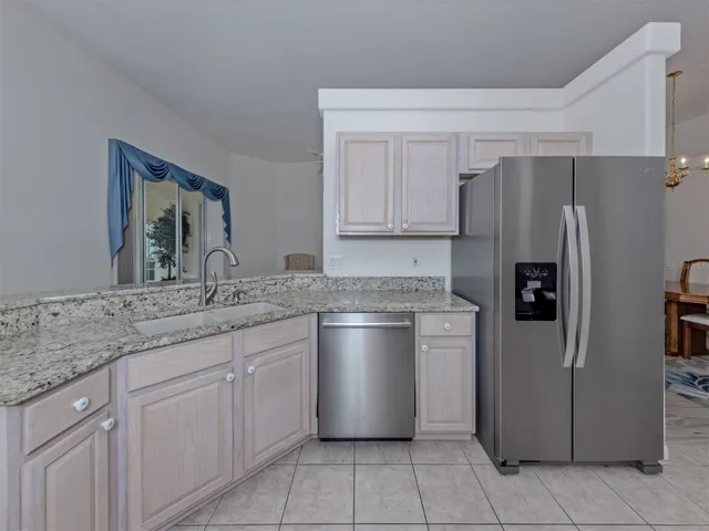 The large kitchen is perfectly situated in this home and very convenient.