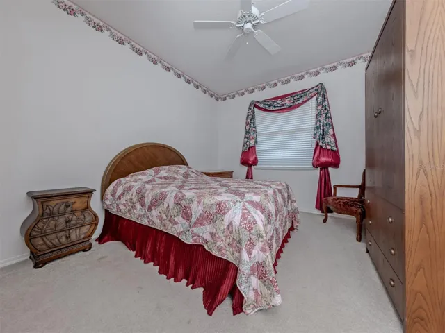 The additional guest room is located on the front of the home near the second full bath creating a tropical oasis for guests