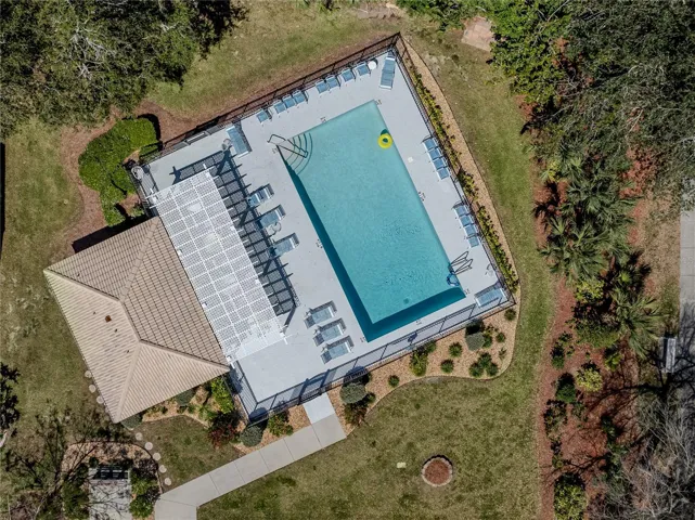 This quaint community includes a community pool with plenty of seating for everyone!