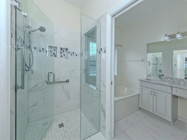 This spa like bath is one you will fall in love with! So spacious and so modern