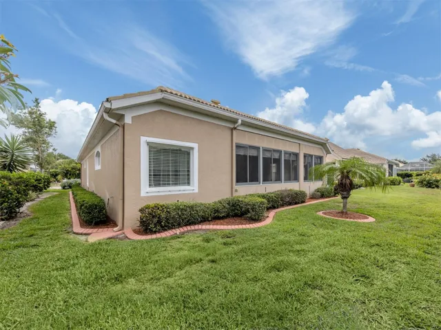 This beautiful home includes custom curbing in the flower beds and lots of extra green space!