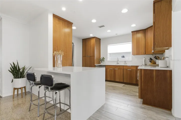 Bar seating and Kitchen