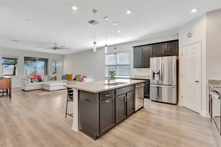 Light and bright kitchen open to dining and family room.