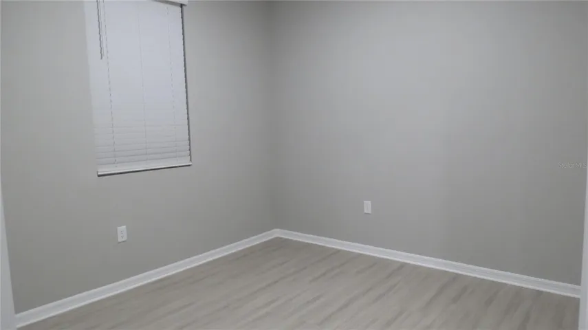 Guest bedroom with luxury vinyl flooring