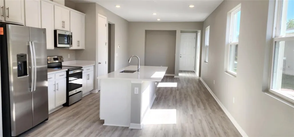 9-foot ceilings and 8-foot doors!