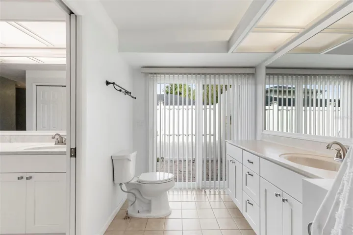 Access to large fenced side yard with paver flooring, located off primary suite this would be a great place for unwinding and enjoying the outdoors, potential for hotub here