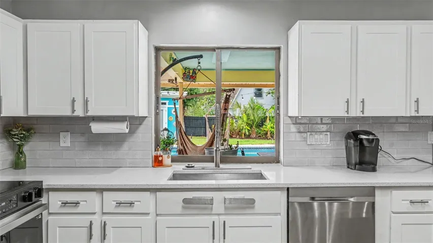 Kitchen Window out to Pool area