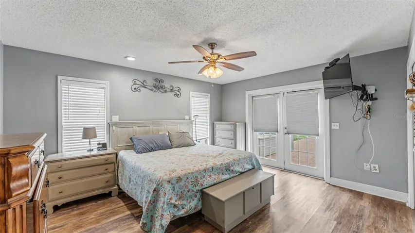 Primary Bedroom with French Doors to Pool