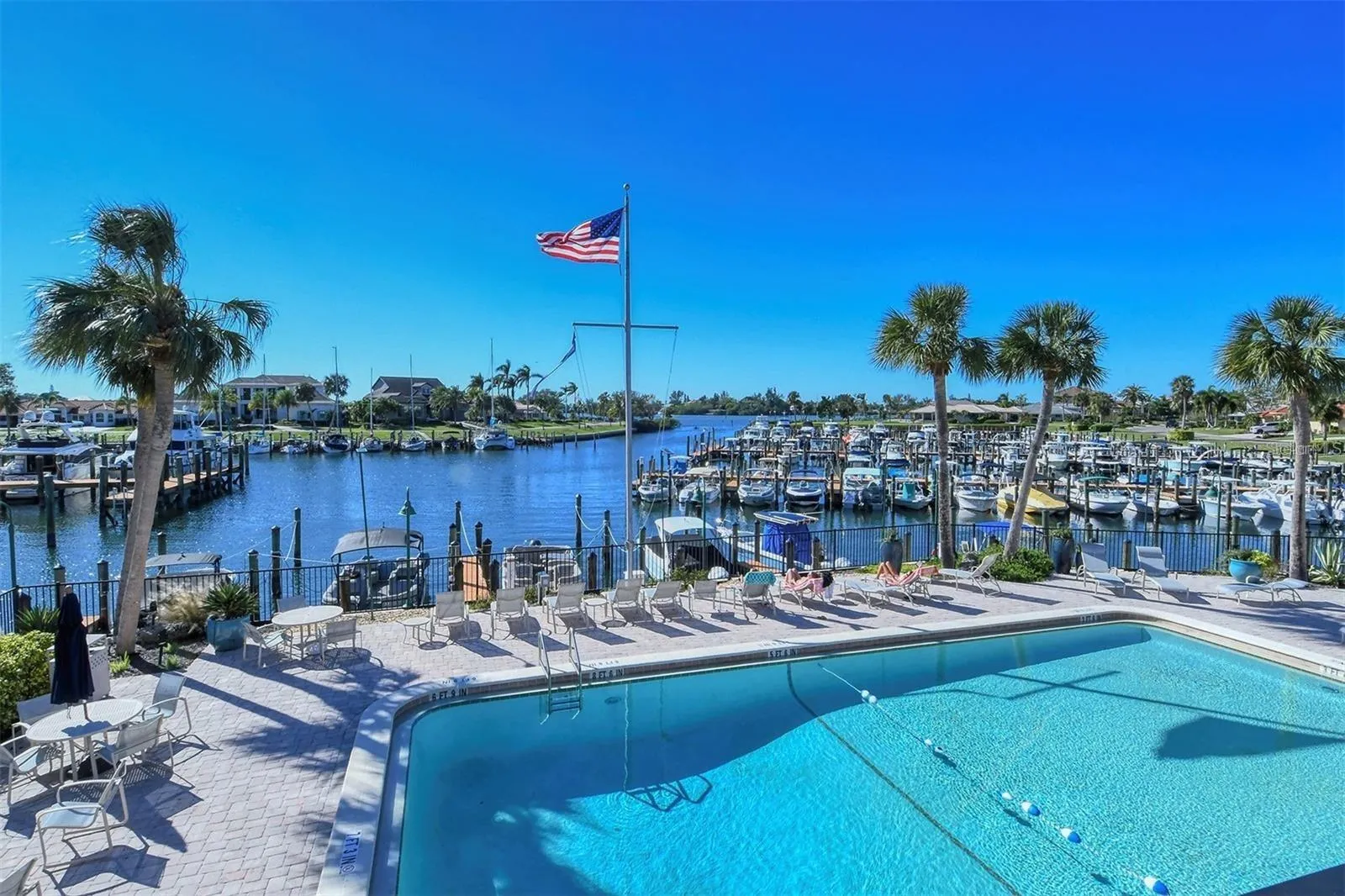 SBYRC clubhouse heated pool looking west out to the marina